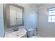 Updated bathroom features a tub with subway tile surround and a large mirror at 60 Cleveland Se St, Atlanta, GA 30316