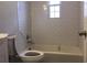 Bathroom features a tub with subway tile surround at 60 Cleveland Se St, Atlanta, GA 30316