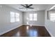 Bright bedroom with hardwood floors, ceiling fan, recessed lights and large windows, offering plenty of natural light at 60 Cleveland Se St, Atlanta, GA 30316