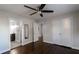 Spacious bedroom with wood floors, ceiling fan, and ensuite bathroom at 60 Cleveland Se St, Atlanta, GA 30316
