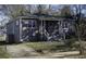 Charming single-story home with gray painted brick, a welcoming front porch, and landscaped yard at 60 Cleveland Se St, Atlanta, GA 30316