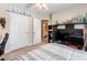 Bedroom featuring a TV, shelving, and a closet, creating a modern and organized space at 981 Golden Meadows Ln, Loganville, GA 30052