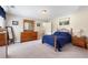 Cozy bedroom with a comfortable bed, dresser, and a relaxing atmosphere at 981 Golden Meadows Ln, Loganville, GA 30052