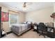 The bedroom features a bed, desk, and window, creating a comfortable and functional space at 981 Golden Meadows Ln, Loganville, GA 30052