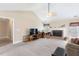 Bright living room featuring neutral walls and a cozy fireplace at 981 Golden Meadows Ln, Loganville, GA 30052