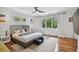 Bright bedroom with large windows and hardwood floors, creating a serene atmosphere with ample natural light at 1155 Mcconnell Dr, Decatur, GA 30033