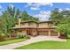 Stunning home featuring an attached two car garage, brick exterior and well manicured lawn at 1155 Mcconnell Dr, Decatur, GA 30033