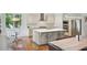 Modern kitchen with stainless appliances, large island, and eating area at 1155 Mcconnell Dr, Decatur, GA 30033