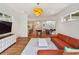 Bright living room with hardwood floors that opens to the kitchen and living spaces at 1155 Mcconnell Dr, Decatur, GA 30033