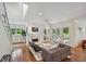 Bright, airy living room featuring a fireplace, hardwood floors and french doors to the exterior at 1155 Mcconnell Dr, Decatur, GA 30033