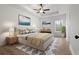 Serene main bedroom featuring a trey ceiling, soft lighting, and coordinated decor for a relaxing retreat at 1687 Harmony Rd, Temple, GA 30179