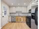 Kitchen with stainless steel appliances and white cabinets at 172 Forest Nw Ln, Marietta, GA 30064