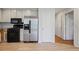 Galley kitchen featuring stainless steel appliances and ample cabinet space at 172 Forest Nw Ln, Marietta, GA 30064