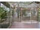 Inviting screened-in porch featuring an airy ambiance and tile flooring at 172 Forest Nw Ln, Marietta, GA 30064