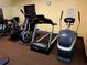 Fitness center area with cardio machines, including a treadmill and elliptical trainer at 1910 Cedar Glenn Way # 4104, Atlanta, GA 30339