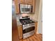 Kitchen featuring stainless steel oven, gas stovetop, and microwave at 1910 Cedar Glenn Way # 4104, Atlanta, GA 30339