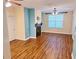 Bright living room featuring wood floors, a fireplace, and plenty of natural light at 1910 Cedar Glenn Way # 4104, Atlanta, GA 30339