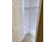 Linen closet with built-in shelving to provide extra storage space at 1910 Cedar Glenn Way # 4104, Atlanta, GA 30339