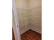 Walk-in pantry with metal shelving and wood floors at 1910 Cedar Glenn Way # 4104, Atlanta, GA 30339