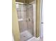 Tiled shower stall featuring a glass door and a handheld showerhead at 1910 Cedar Glenn Way # 4104, Atlanta, GA 30339