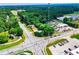 Aerial view shows a busy road with crosswalks and various businesses at 5950 Central Church Rd, Douglasville, GA 30135