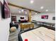Large basement with foosball, air hockey, pool, and ping pong for entertainment at 5950 Central Church Rd, Douglasville, GA 30135