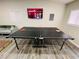Recreation room with ping pong table and mounted television at 5950 Central Church Rd, Douglasville, GA 30135