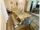 Charming dining area features a farmhouse table with bench seating and stylish decor at 5950 Central Church Rd, Douglasville, GA 30135