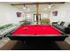 Bright game room features a billiards table, ping pong, foosball, and stylish seating, perfect for entertaining guests at 5950 Central Church Rd, Douglasville, GA 30135