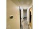 Hallway with luxury vinyl plank flooring and doorways to other rooms in the home at 5950 Central Church Rd, Douglasville, GA 30135