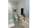 Clean bathroom featuring a glass-enclosed shower, a soaking tub, and updated fixtures and decor at 10825 Pinewalk Forest Cir, Alpharetta, GA 30022