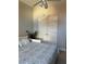 Bedroom with a bed, closet, a plant, and modern decor at 10825 Pinewalk Forest Cir, Alpharetta, GA 30022