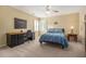 Neutral carpeted bedroom featuring a desk, and a bed at 2012 Golfers Way, Villa Rica, GA 30180