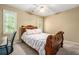 Bedroom with neutral colored walls, carpet and furniture at 2012 Golfers Way, Villa Rica, GA 30180