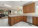 Bright kitchen with stainless steel appliances and seamless flow into the living room at 2012 Golfers Way, Villa Rica, GA 30180