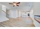 Open floor plan includes living room with staircase leading to the kitchen at 612 Leafy Branch Way, Mcdonough, GA 30253