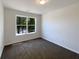 Cozy bedroom with natural light from the window at 956 Buckhorn Bnd, Locust Grove, GA 30248