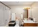 Neutral bathroom featuring a shower and single sink vanity and standard fixtures at 3560 Riverchase Dr, Decatur, GA 30034
