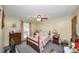 Small bedroom with standard ceiling fan, carpet, and single window at 3560 Riverchase Dr, Decatur, GA 30034