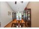 Formal dining room features a large wooden table with seating for ten and a glass-front china cabinet at 3560 Riverchase Dr, Decatur, GA 30034