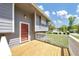 Inviting front porch with a white railing, perfect for enjoying the outdoors and neighborhood views at 3560 Riverchase Dr, Decatur, GA 30034
