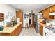 Efficient kitchen with wood cabinets, laminate countertops, and stainless steel appliances at 3560 Riverchase Dr, Decatur, GA 30034