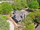 Aerial view of the home showing mature trees, gardens and driveway at 1102 Emory St, Oxford, GA 30054