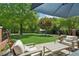 Large backyard patio with lounge seating offering a relaxing outdoor space at 1102 Emory St, Oxford, GA 30054