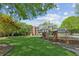 Charming home with a sprawling lawn and tasteful landscaping at 1102 Emory St, Oxford, GA 30054
