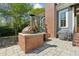 Outdoor brick pizza oven on the patio, perfect for entertaining and outdoor cooking at 1102 Emory St, Oxford, GA 30054