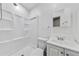 Bright bathroom with modern fixtures and a shower-tub combo at 1685 Carroll Nw Dr, Atlanta, GA 30318