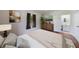 Bedroom includes hardwood floors, neutral paint, closet, and ensuite bathroom at 1685 Carroll Nw Dr, Atlanta, GA 30318