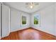 Charming bedroom with hardwood floors, bright windows, and a ceiling fan at 1685 Carroll Nw Dr, Atlanta, GA 30318