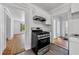 This kitchen features stainless steel appliances and white cabinets at 1685 Carroll Nw Dr, Atlanta, GA 30318